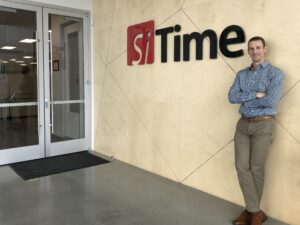 Man standing next to SiTime building