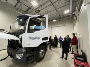 Participants in Autonomous Street Sweeper demonstration