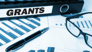 business folder with label grants