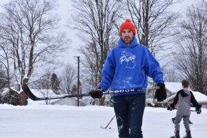 Scott Thomas playing hockey