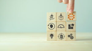 wooden cubes with business icons