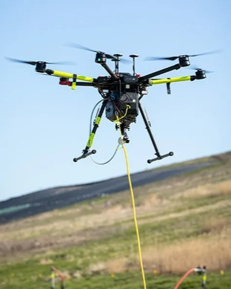 Image of a SnifferDRONE detecting methane at ground surfaces.