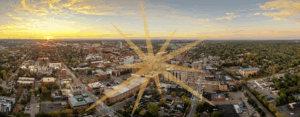 Ann Arbor cityscape, aerial, with SPARK logo starburst